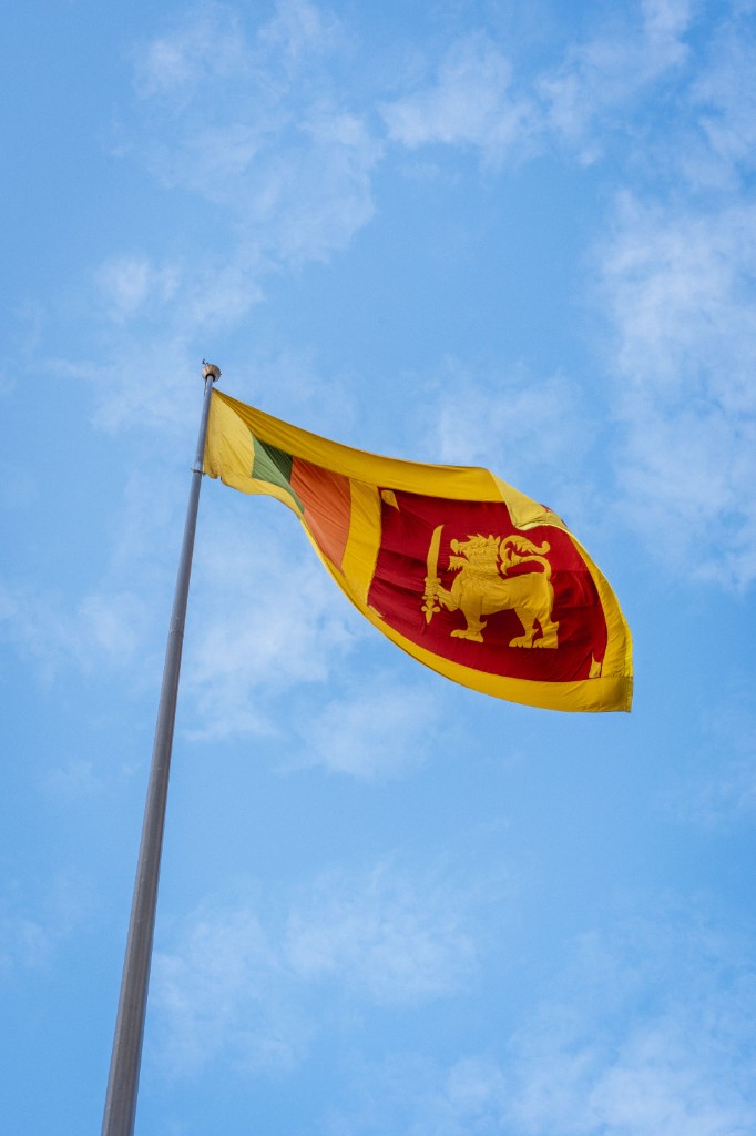 Sri Lankan flag representing national development contributions