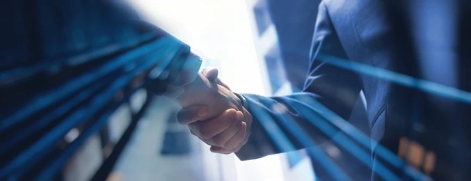 Business handshake representing capital provider partnerships